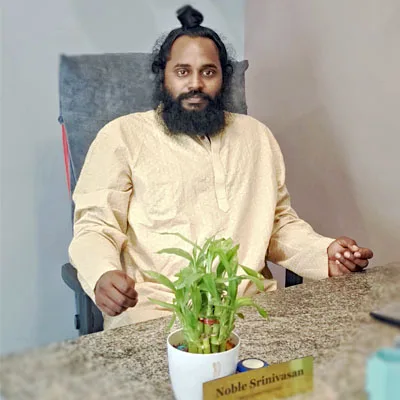 Noblesrinivasan, founder of Muladhara Yoga Wellness